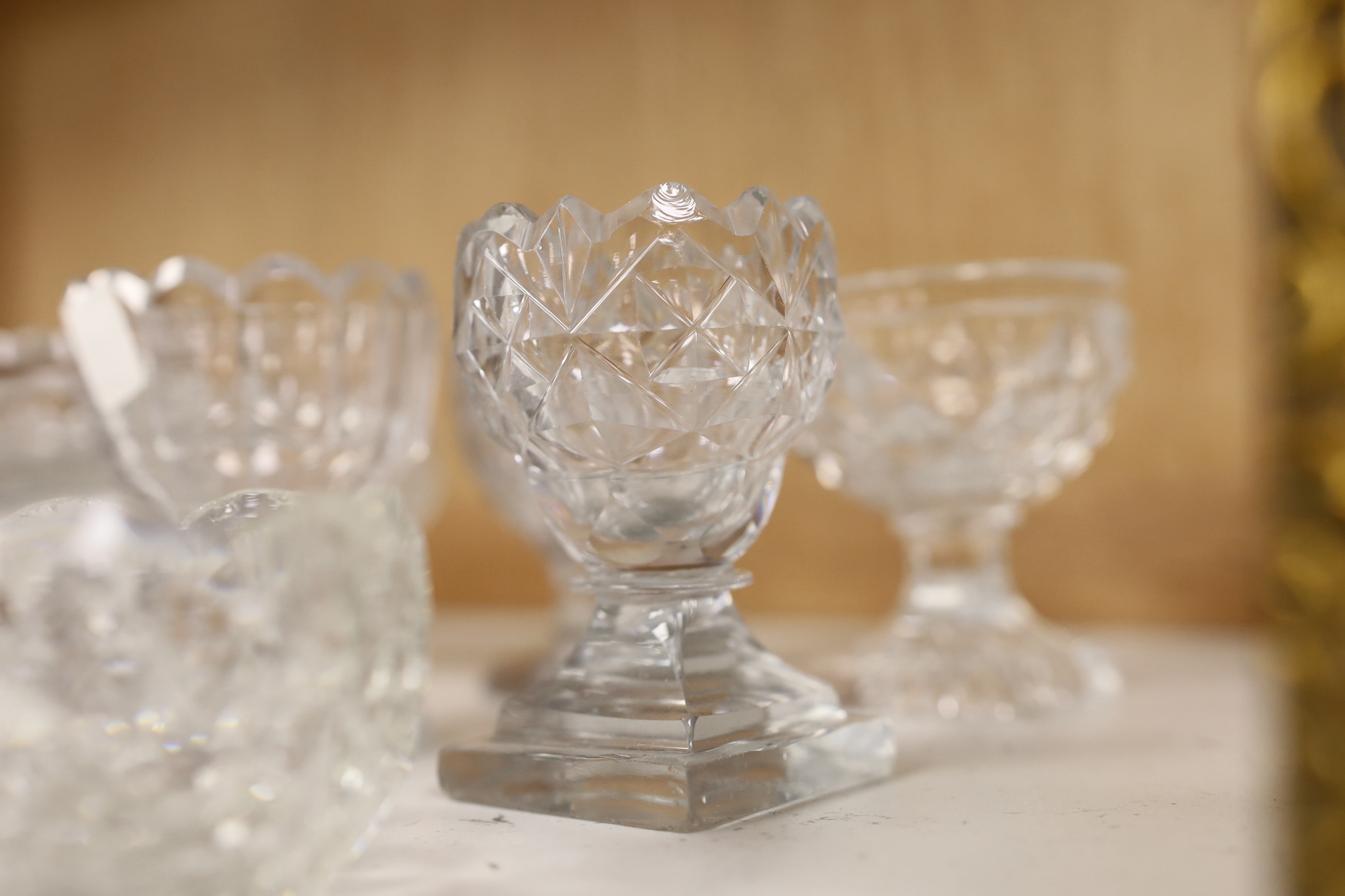 A group of twelve Georgian cut glass salts, tallest 9cm